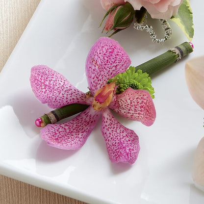 Pink Mokara Boutonniere –  Velvet Leaf And Stem, Las Vegas NV